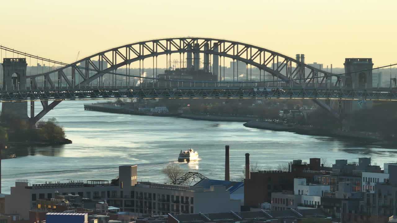 Aerial view of Hell Gate Bridge at sunrise. Shot in New York City.
