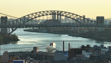 aerial view of hell gate bridge at sunrise. shot in new york city.