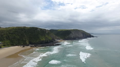 Cinematic-aerial-flying-along-coast-of-East-London-South-Africa