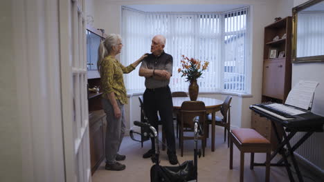 Elderly couple in a cozy living room