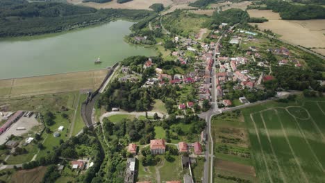 aerial approach to the city of dobromierz with a water dam and reservoir of drinking water