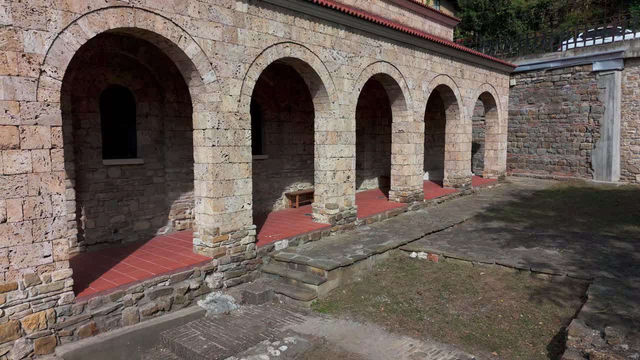 Holy Forty Martyrs Church drone pullback revealing surrounding landscape and historic Veliko Tarnovo.