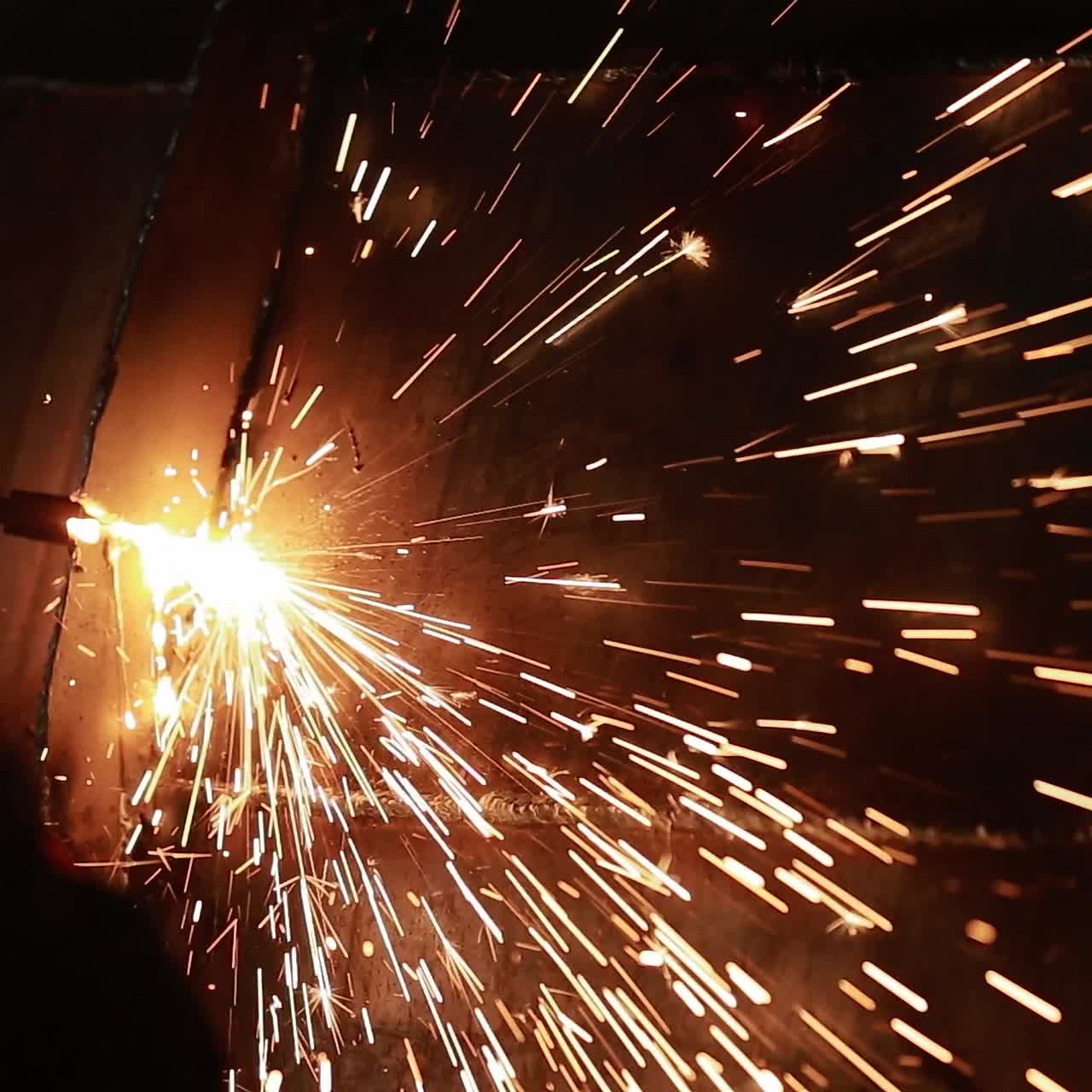 Steel welding blacksmith in factory