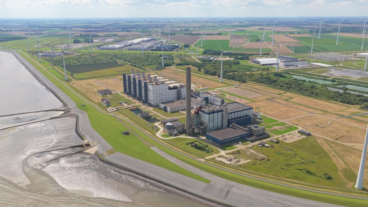 Wide aerial panorama of Eemshaven electricity plant near harbor landscape