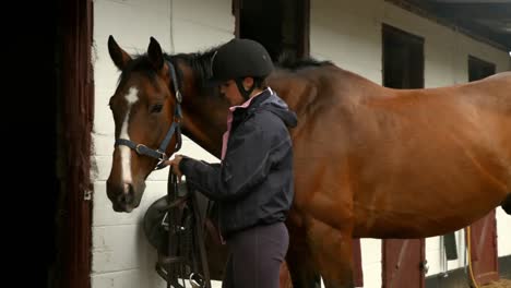 pretty brunette with her horse