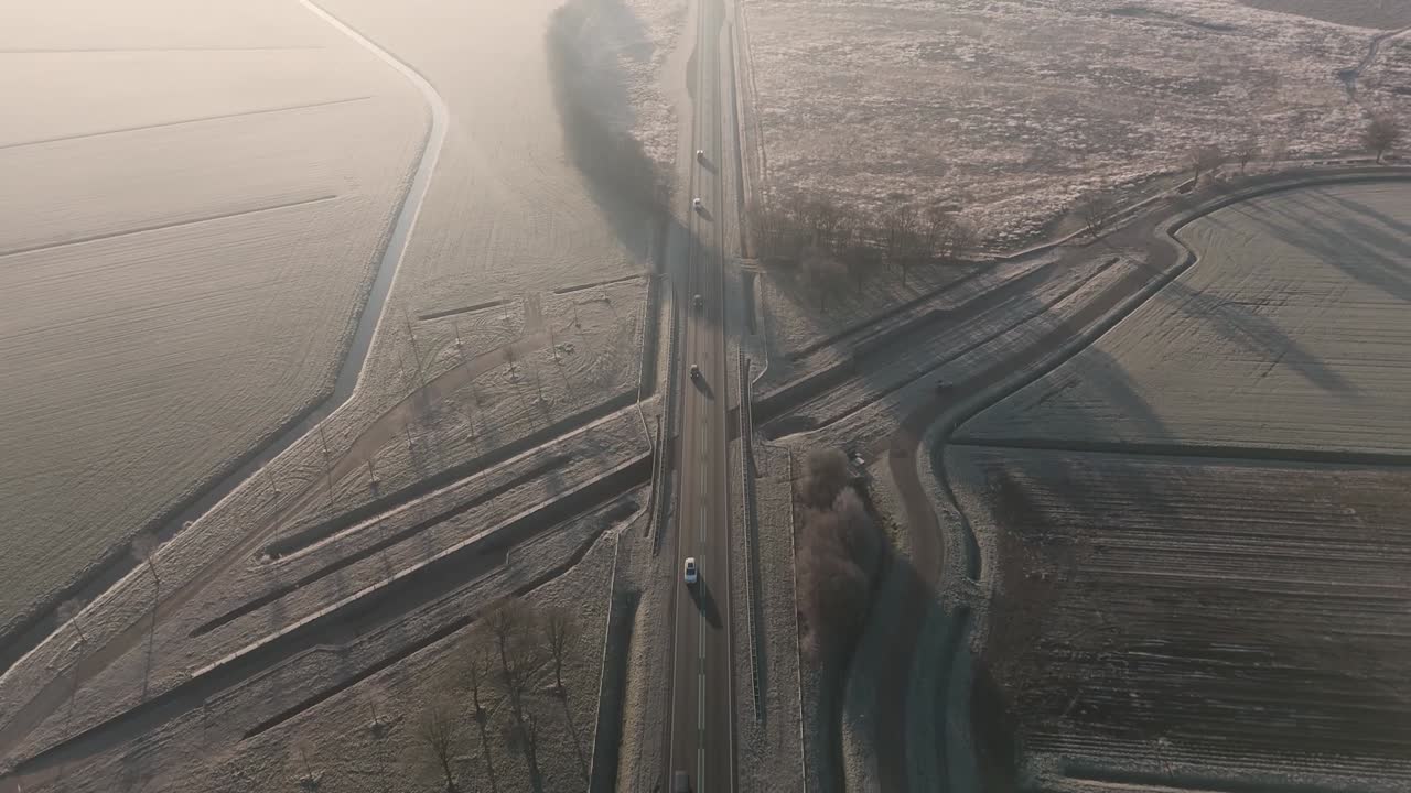 Frozen Winter Road Through Fields