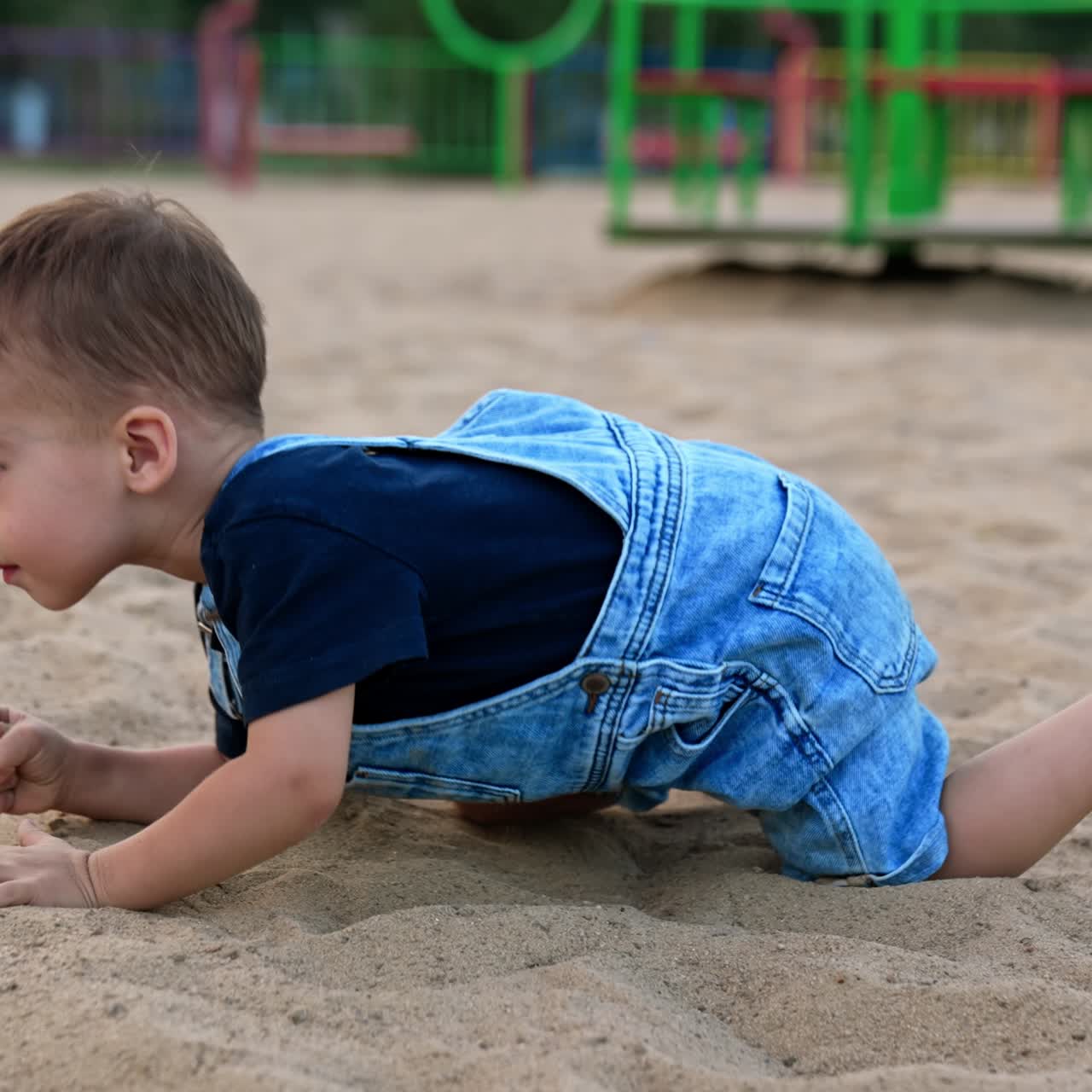 Water playing with splashing. Little funny boy playing on a river beach