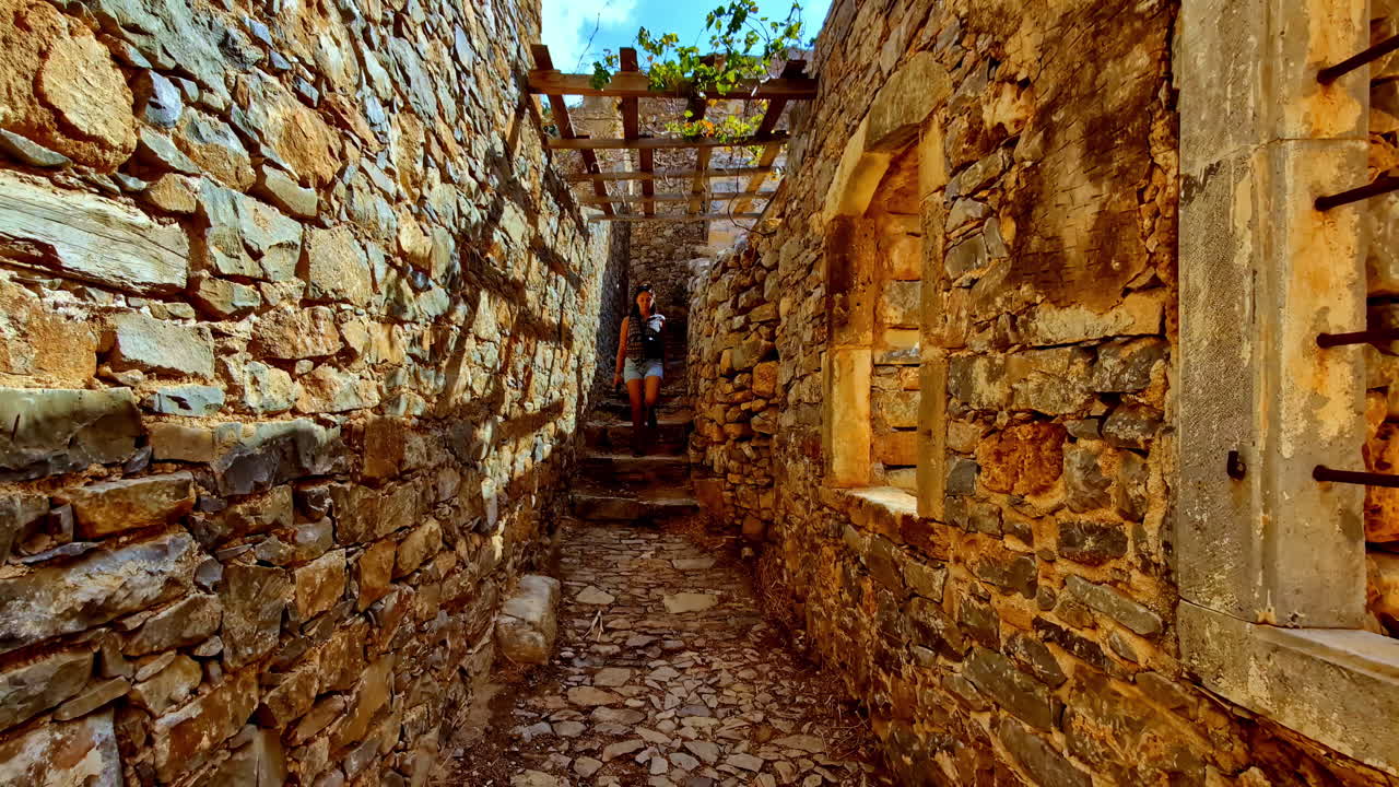 beautiful and interesting ancient stone ruins and corridors of the fortress of Spinalonga, Kalydon, in Elounda in northeastern Crete, in Lasithi, Elounda, Greece.