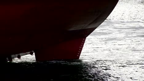 Bulbous bow and keel of bulk cargo ship, close up