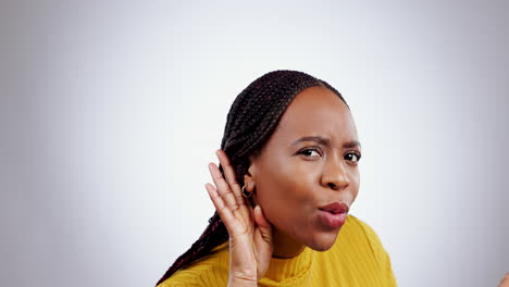 hands, ear and face of black woman in studio