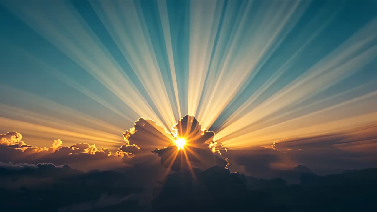 Fanning crepuscular rays as sun peeking through gap, central cloud rim-lighting sky at sunrise