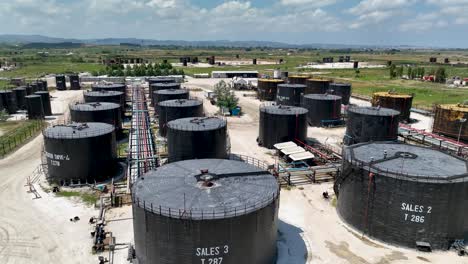 industrial oil tanks filled with diesel on a rural area in the countryside