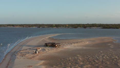 Aerial:-The-lagoon-of-Atins,-Brazil-during-sunset-with-people-kitesurfing