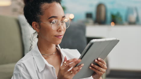 woman using digital tablet
