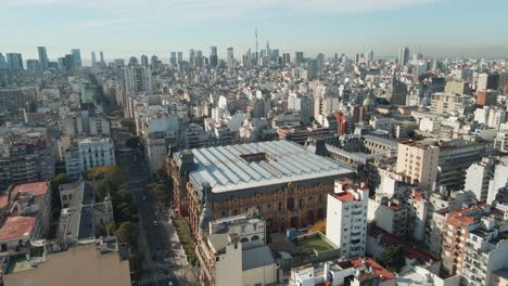 Aerial-dolly-in-flying-over-the-Palace-of-Running-Waters,-a-National-Historical-Monument-in-Buenos-Aires