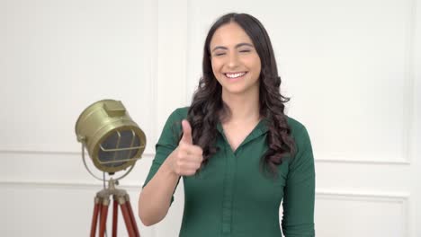 Indian-girl-showing-Thumbs-up
