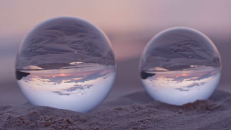 crystal balls sphere reveals sunset seascape