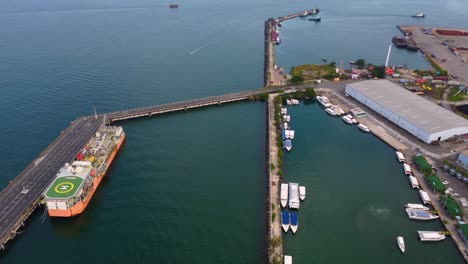 aerial view of a busy port with ships and boats docked