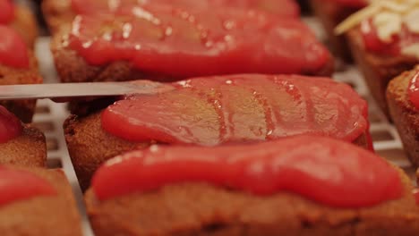 artezan bread with red strawberry jam on top, fresh bake double chocolate banana artesian bread in bakery shop close-up. artisan bread is making by skill bakers using natural and high-quality ingredients. food with health and flavour benefits. sweet breads for dessert and breakfast