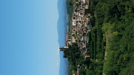 aerial drone view of rosignano monferrato picturesque village and church in piedmont region of northern italy