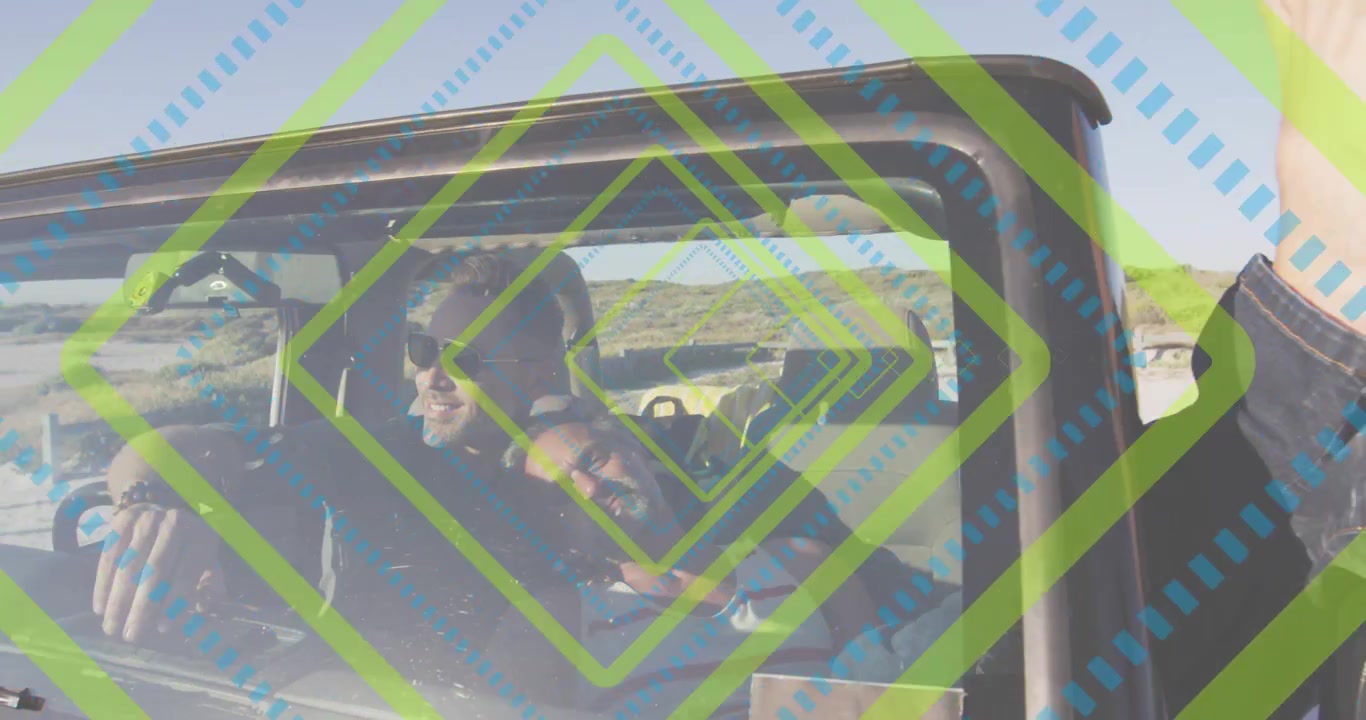 Due uomini in jeep, con un'overlay che si muove facendo voltare lo sguardo al conducente, e un passeggero a piedi nudi che condivide il viaggio.