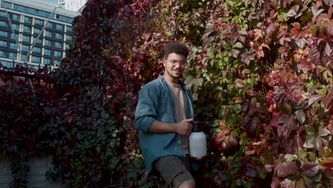 person taking care of plants