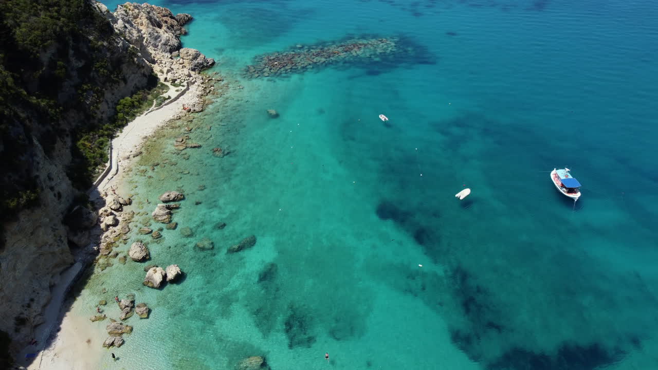 Fly over Agios Nikitas beach and crystal clear waters