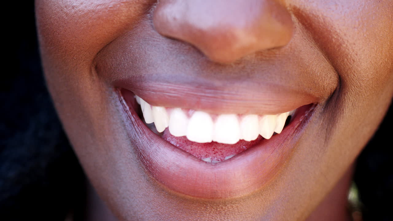 Close up of teeth of a smiling black woman