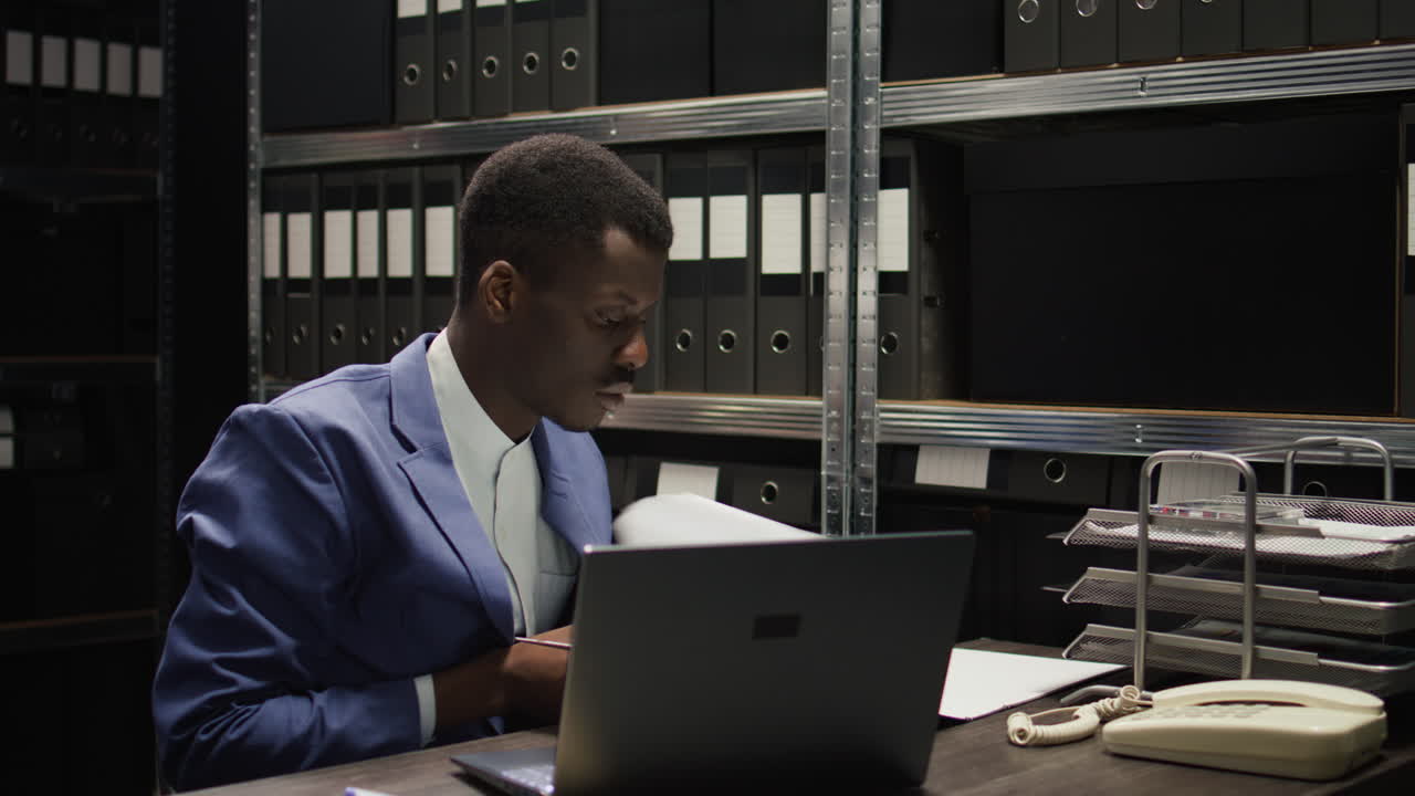 Man working in an archive office