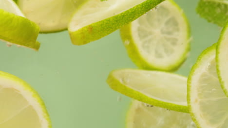 lime slices in soda water