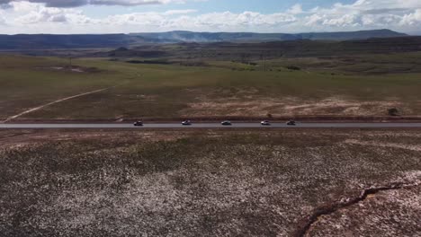 Lateral-aerial-shot-of-the-Troncal-10-highway,-which-crosses-the-entire-Gran-Sabana-in-Venezuela