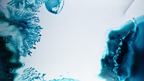 ink floating in water, a macro shot showing beautiful blue color patterns and textures