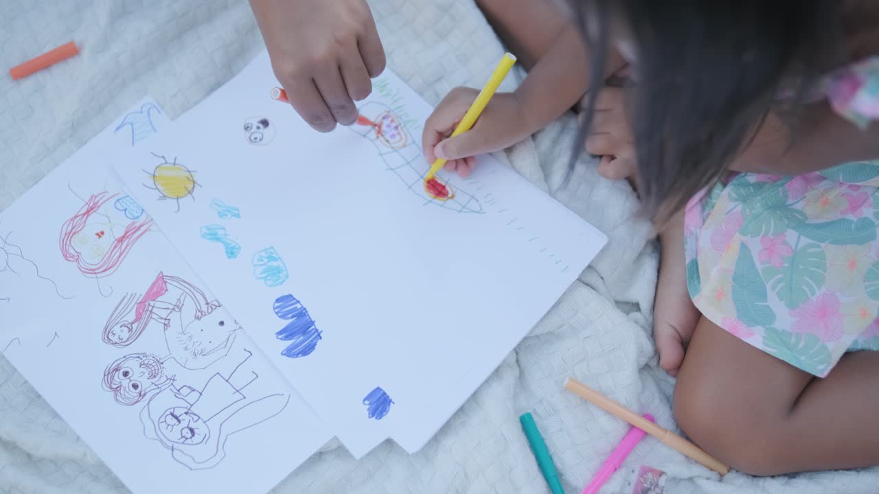 Child and Parent Drawing Together