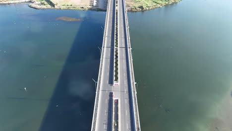 low tilting drone shot shows the kretek 2 bridge in bantul, indonesia