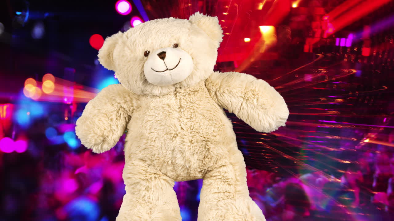 테디 베어가 나이트클럽에서 춤을 춘다