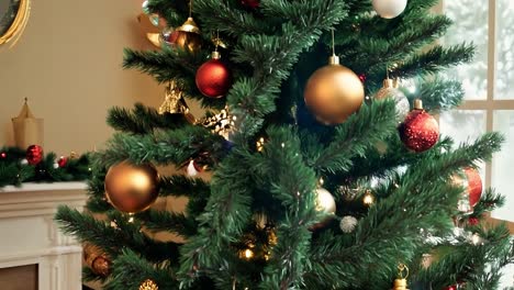 close up of a christmas tree decorated with ornaments and lights