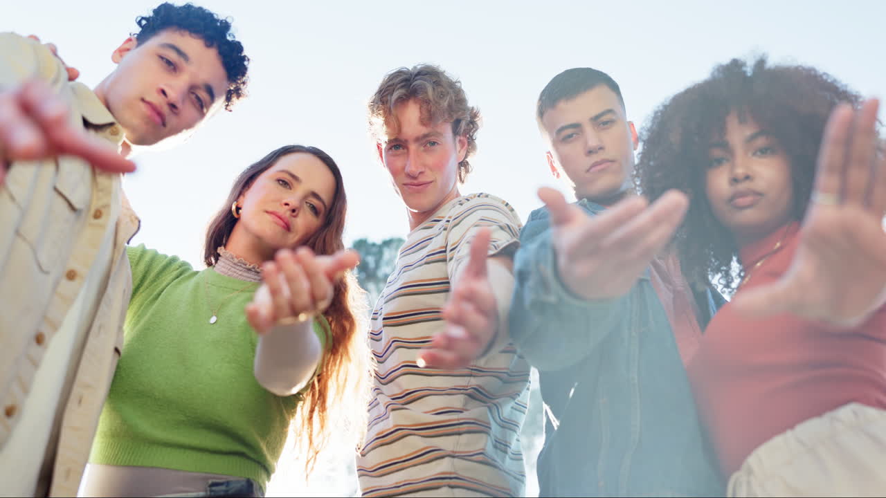 Group of diverse young friends posing
