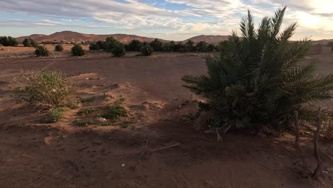 a view of sahara desert in merzouga village in merzouga desert, morocco, north africa. pov shot