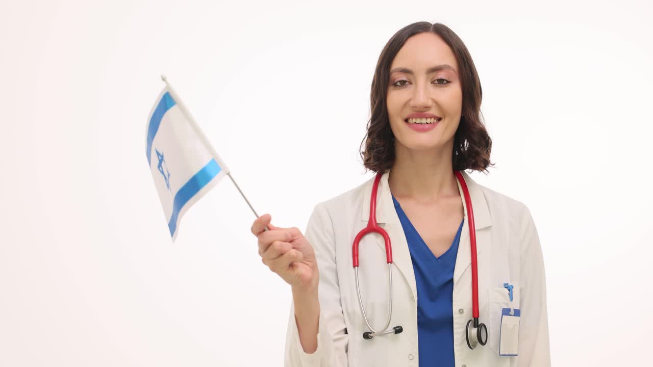 Doctor holding Israeli flag
