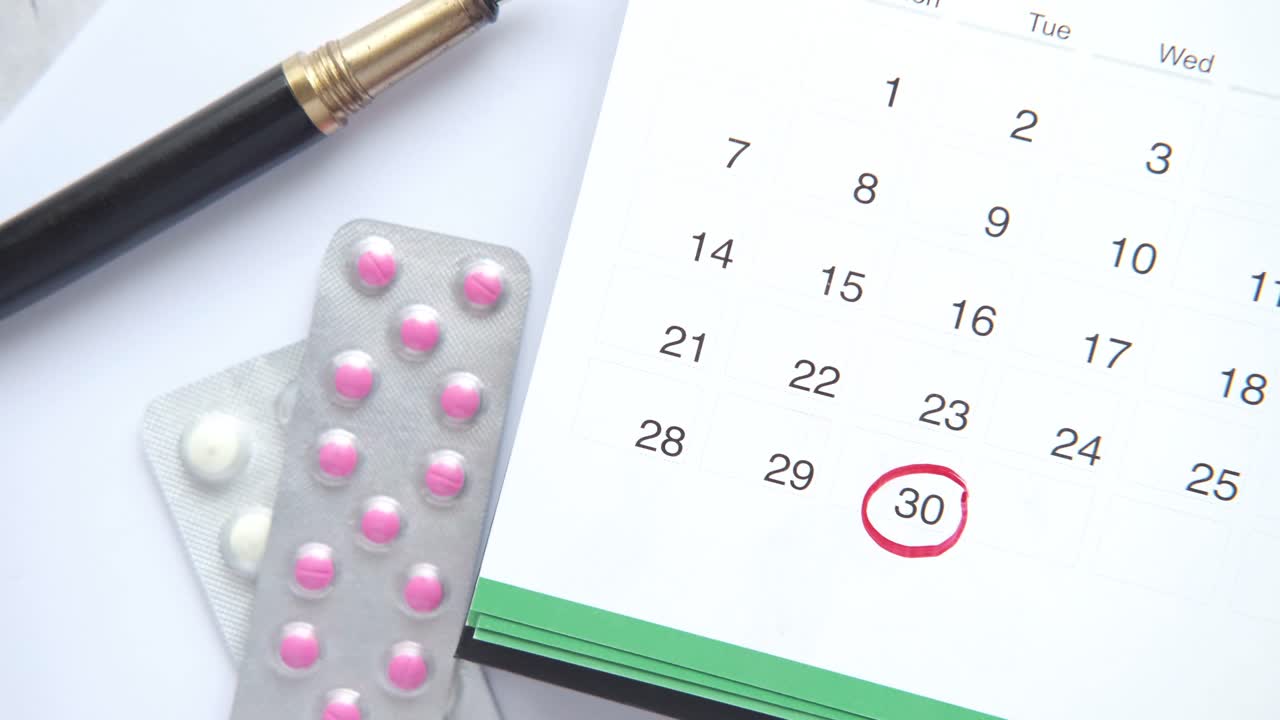 Calendar with Medication Packages and Pen