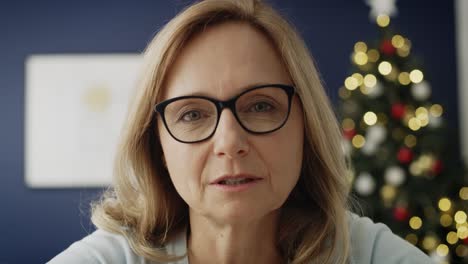 video of mature woman during a video conference during christmas