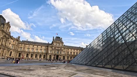 tourists at louvre museum, paris, france