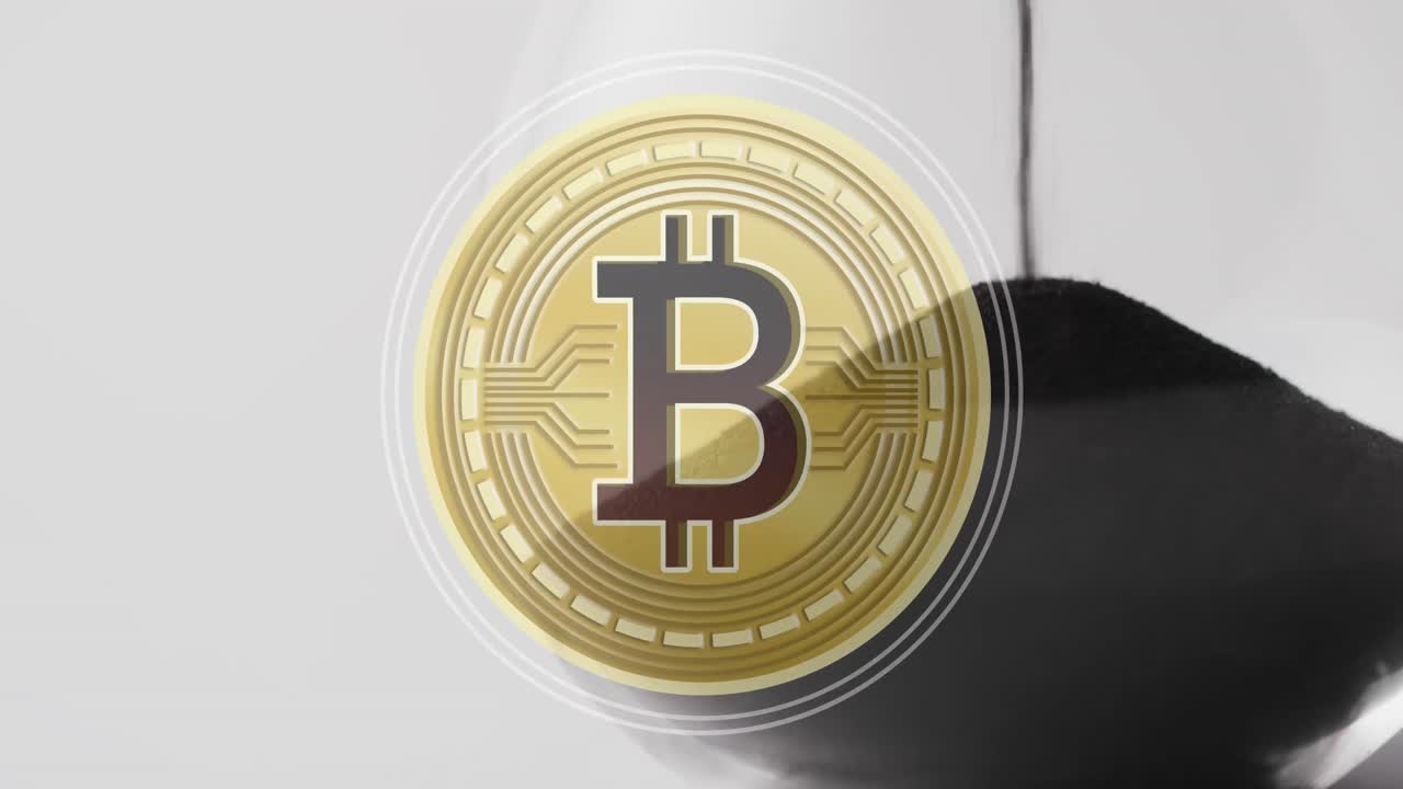 animación del símbolo de bitcoin sobre el reloj de arena
