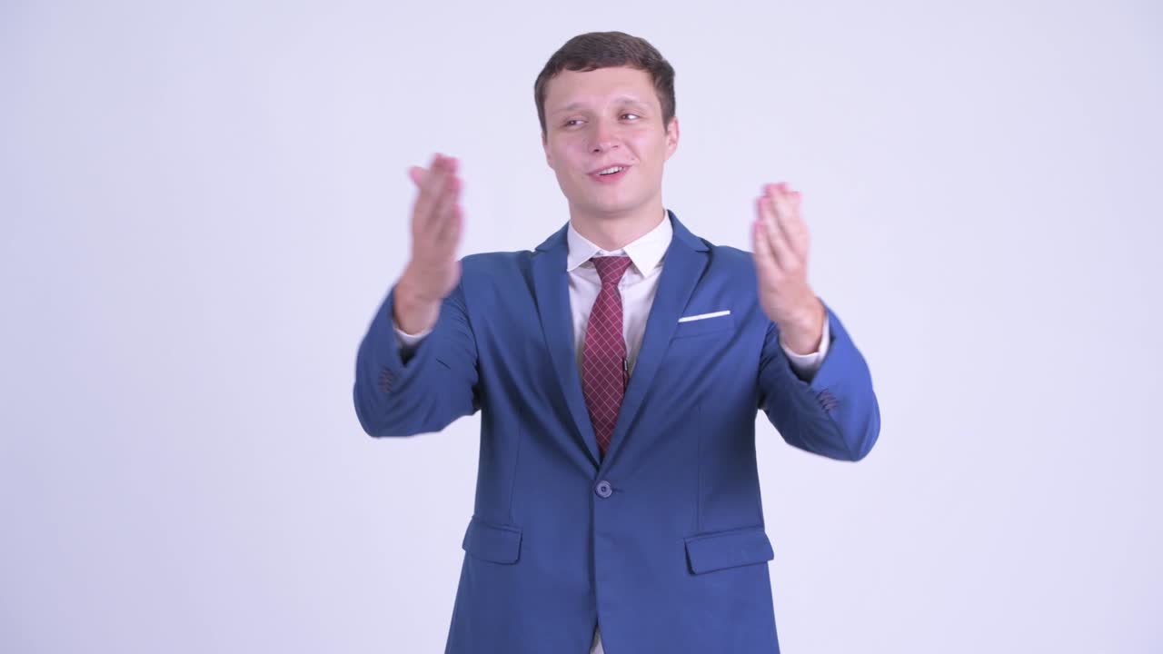 행복한 젊은 잘생긴 사업가