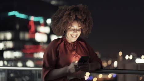 Night-balcony,-phone-and-woman-typing-social-media