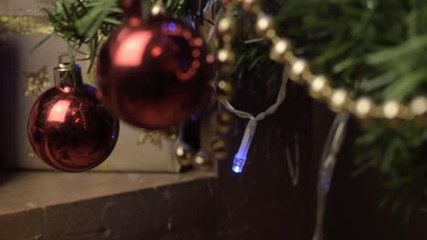 christmas tree with gold tinsel and  decorations  macro panning
