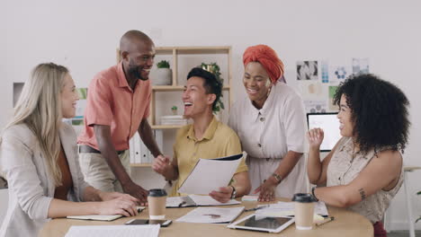 Business-people-giving-high-five-in-meeting