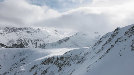 panning slowmotion panoramic drone shot of the pirin mountainpeaks, in bulgaria