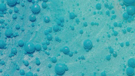 blue bubbles on a sparkling surface