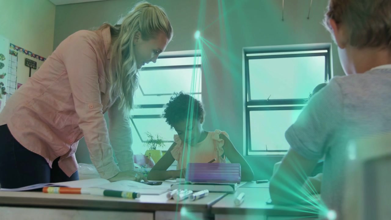 Teacher leaning over classroom desk guiding child writing, green overlay fading, pencil case